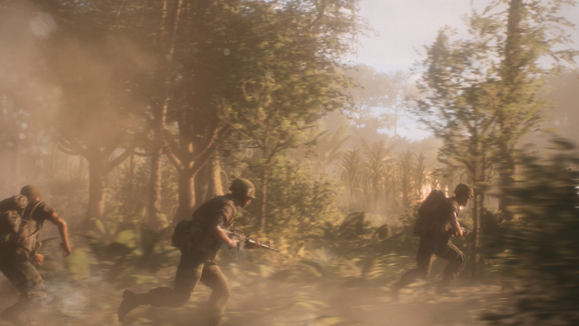 Men in combat fatigues run through trees and bushes as dirt kicks up around their feet and the camera blurs.