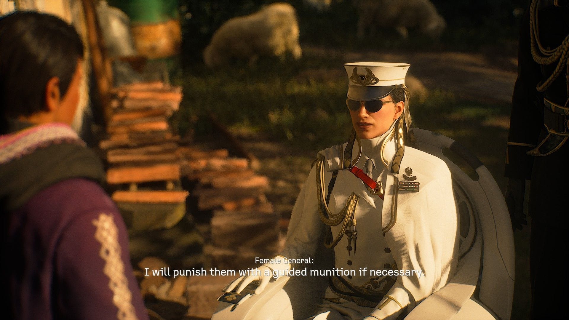A general in a white uniform sits in her wheelchair and speaks to a villager, saying she will strike some ne'er-do-wells with "guided munitions if necessary".