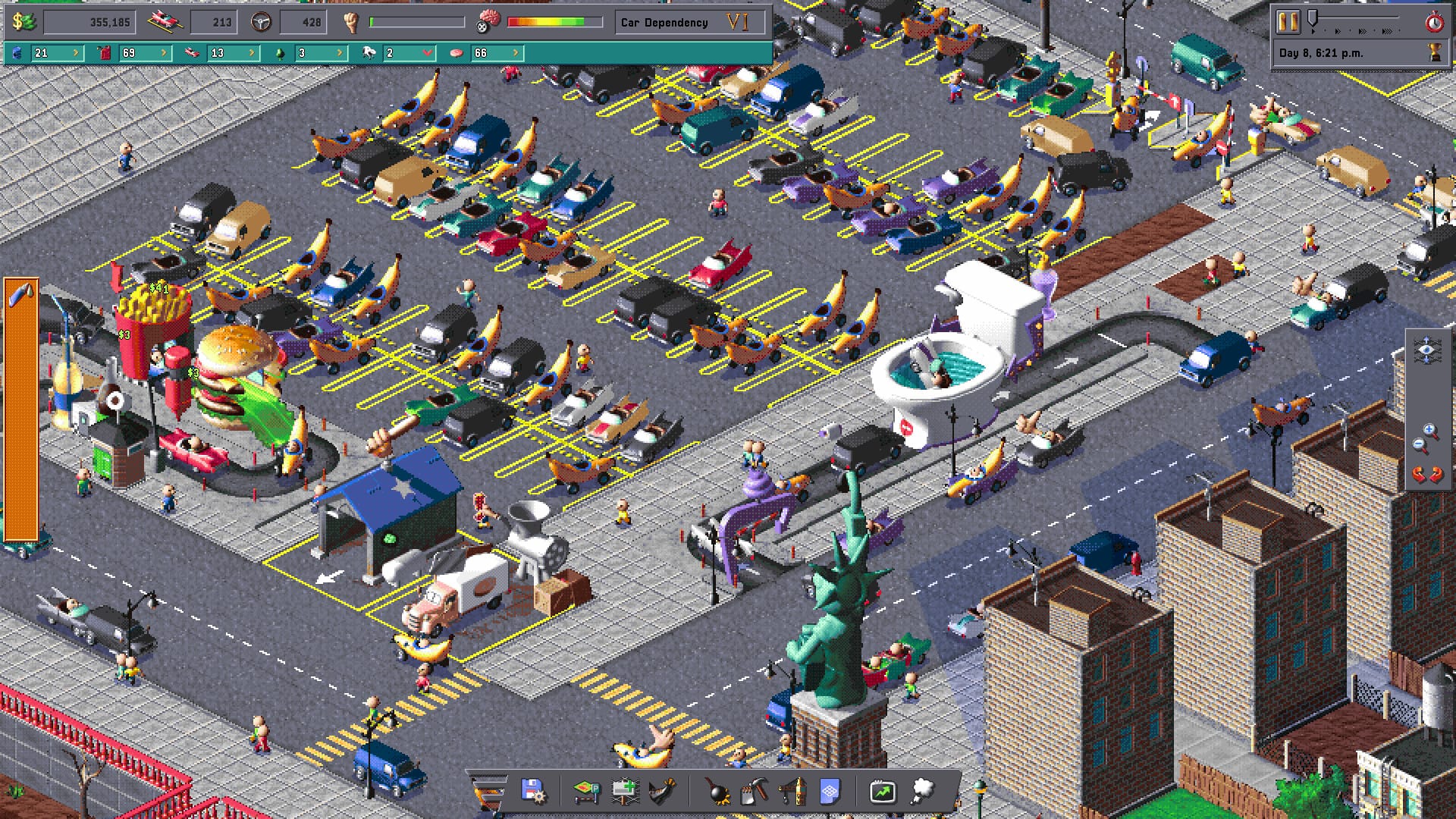 A car park filled with banana cars. Also there is a giant toilet bowl, which I think is a car wash?