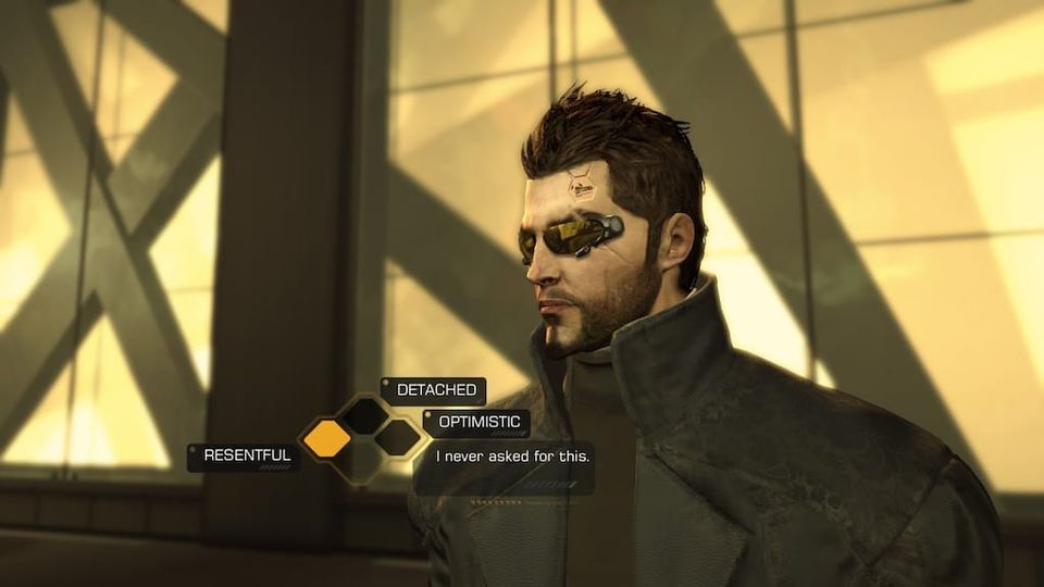 A screenshot of Deus Ex Human Revolution showing Adam Jensen, with the dialogue wheel selecting the "Resentful" option of "I never asked for this".
