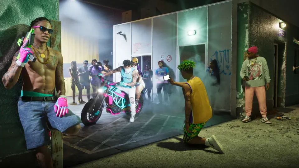 A GTA 6 screenshot showing a group of people watching two people do a burnout on a motorcycle.