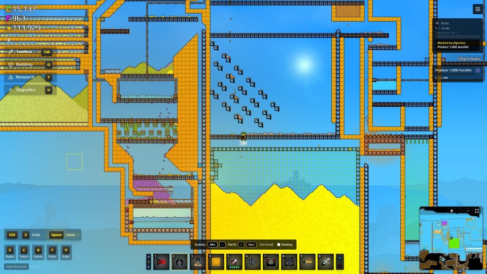A pixel factory of small squares, with a large pile of gold at the bottom of the screen.