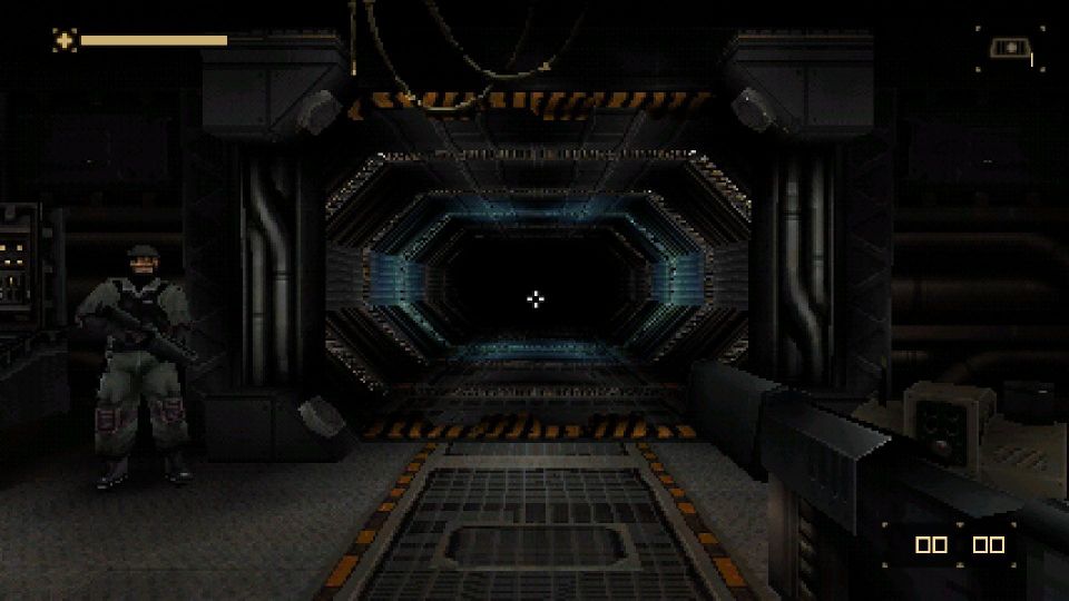 A metal corridor guarded by a security officer with a rifle.