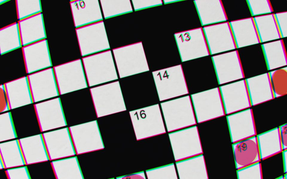 A close-up of a crossword, as yet unsolved. Tantalising!