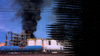 A partially blacked-out image of a 2019 fire at the KMCO Chemical plant in Crosby, Texas.