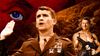 A composite image of Oliver North at the congressional hearings on Iran-Contra and Ronald Reagan as Rambo overlaying a jungle backdrop.