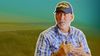 A composite image of U.S. Senate candidate Dan Osborn overlaying a field in Nebraska.
