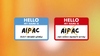 In an illustrated image, two name tags have “AIPAC” crossed out with the names of other political organizations written below.