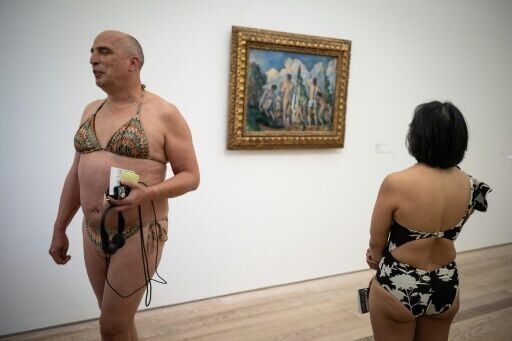Immersive art: museum-goers in bikinis dive into Cezanne