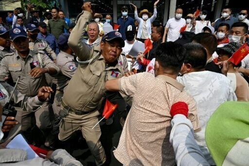 Cambodian PM's cousin says owned 30% of scam-linked firm