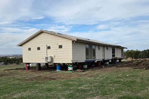 Australian couple moves house from wrong plot