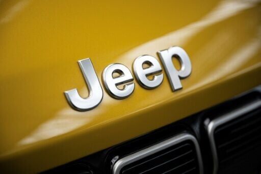 Carmaker Stellantis swings back into profit as sales climb