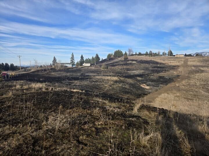 Grass fire contained in Polson after 2 properties suffered minor damages