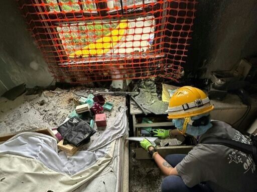 Photos, clothes, ashes: Hongkongers pick through fire-ravaged homes
