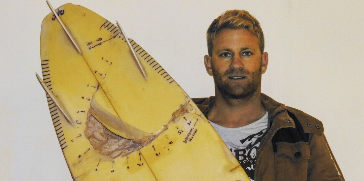 Surfer attacked by two sharks paddled to safety with one hand