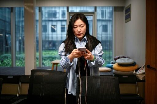 Young Chinese use AI to launch one-person firms over job anxiety