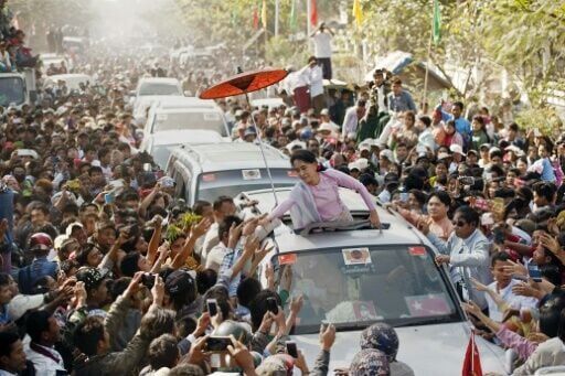 Myanmar's Suu Kyi back in the spotlight but still out of sight