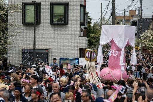 Revellers parade giant penises to dash stigma in Japan's fertility festival