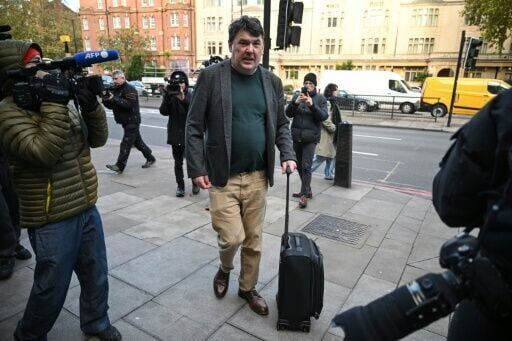 UK court clears comedy writer of damaging transgender activist's phone