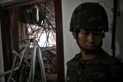 Behind Cambodian border casino, Thai military shows off a scam hub