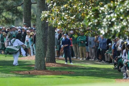'Scrappy' McIlroy leans on experience for share of Masters lead