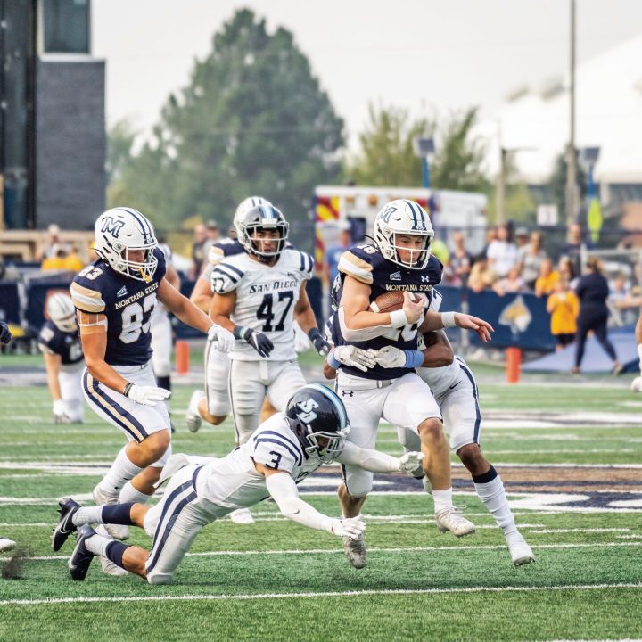 Cats dominate, win 52-10 at home