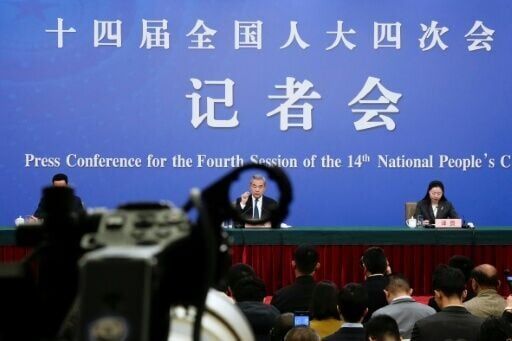 China FM urges US to manage differences in face of trade woes