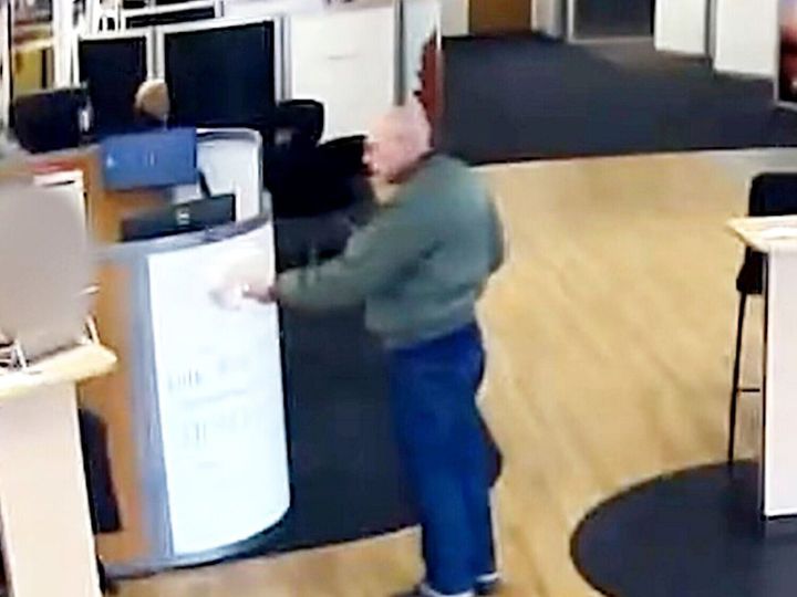 Moment 64-year-old man tries to rob bank armed only with vape