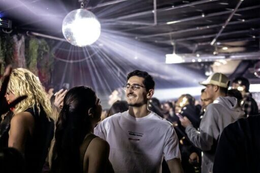 Israelis dance on at Tel Aviv 'bunker party' as missiles fly