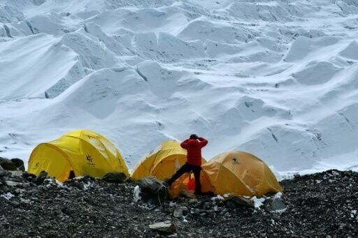 Climbers open Everest route past dangerous ice block