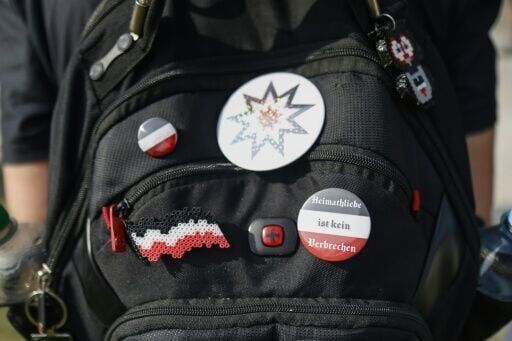 Three go on trial in Germany over plot to overthrow government