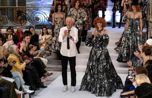 UK king opens London fashion week despite brother's arrest