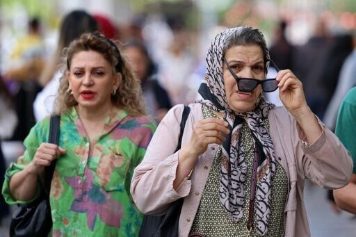 As some hijabs come off in Iran, restrictions still in place