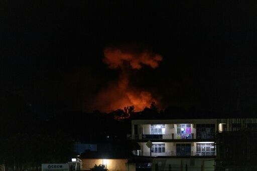 Blasts sow panic in Burundi's main city after arsenal fire