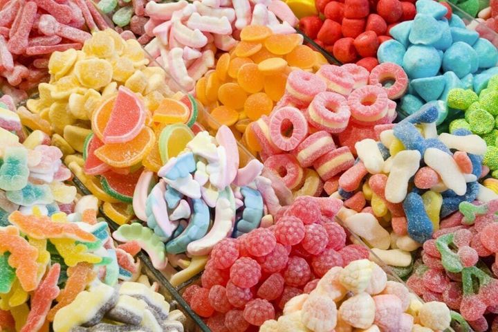 How much candy do Americans eat in a whole year?