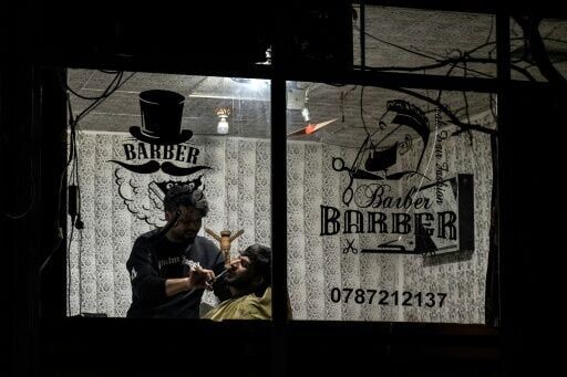 Afghan barbers under pressure as morality police take on short beards