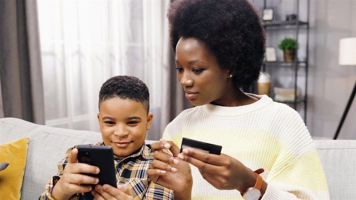 How to teach kids the value of money when they can’t see it