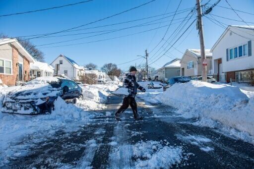 Northeast US faces power cuts and school closures after snowstorm
