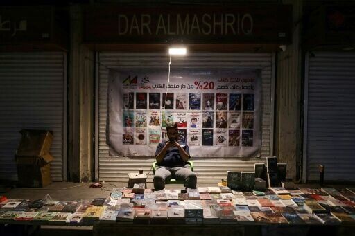 'Normal, but not really': Iraqis try to carry on as missiles fly