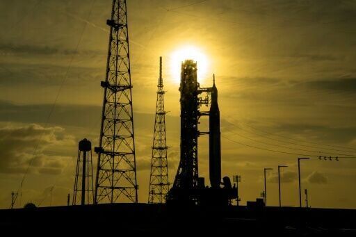 Astronauts strapped in for historic US lunar launch