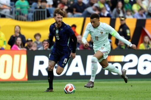 Mbappe on target as France shrug off red card to beat Brazil