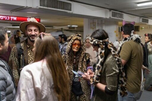 Underground party scene: Israelis celebrate Purim in air raid shelters