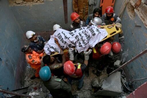 At least 16 killed after building collapses in Pakistan following blast