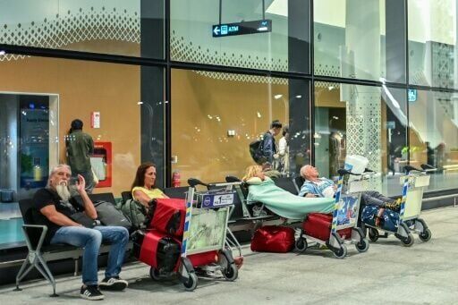 Thousands stranded as Iran conflict shuts Mideast hubs