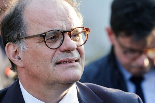 France's Macron taps ex-aide to head central bank