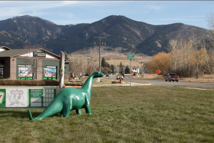 The Sinclair dinosaur takes a hike to the M