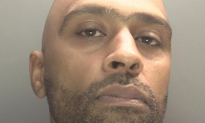 Man jailed over making 100 fake calls to cops