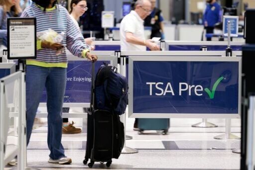 Airport workers miss pay as US government shutdown hits one month