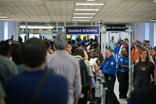 Paychecks and passengers at US airports start moving