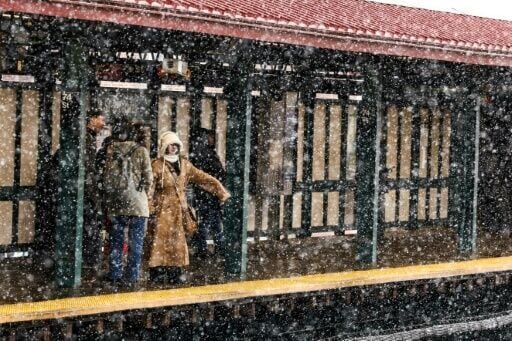 Winter storm blankets US northeast as travel bans imposed